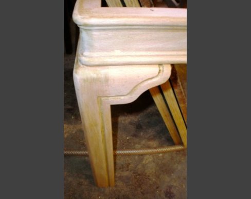 A new leg, shaped and fashioned for a broken table. New table leg
